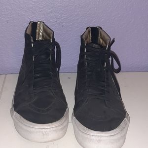 Black and gold women's Vans